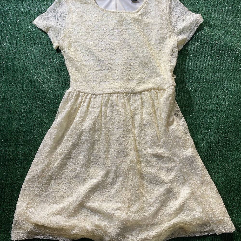 New without tags and a minor tear